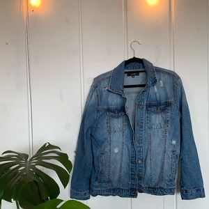 Distressed denim jacket